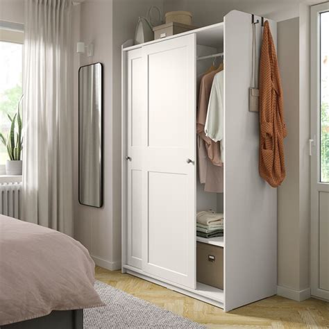 Choose different colours, looks and materials (like solid wood) to suit your style. HAUGA Wardrobe with sliding doors, white, 118x55x199 cm - IKEA