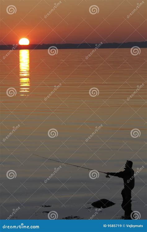 Fisherman In The Sunset Stock Image Image Of Orange Fishing 9585719