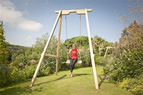 Single Oak Rope Swing For Adults And Children Sitting Spiritually