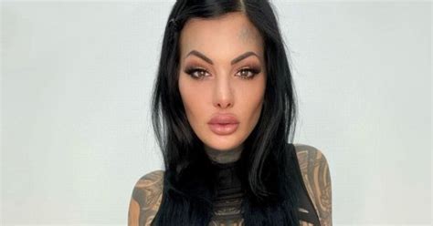 tattoo model flaunts ink in extreme cut out dress and risks baring all flipboard
