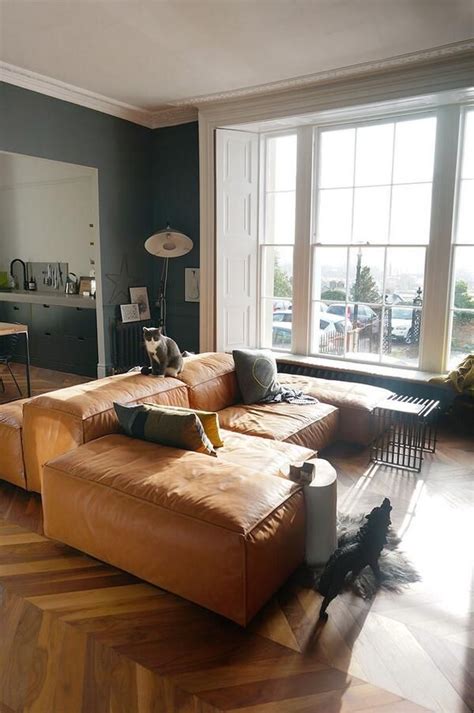 Bring echoes of the natural world inside with a touch of green: between dog and wolf on | Tan sofa, Blue green and Gray