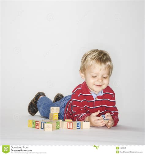 Boy Playing With Blocks Stock Photos Image 2425843
