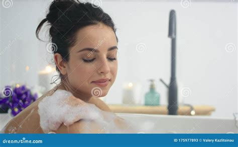 Close Up Sensual Woman Lying In Bathtub With Foam Romantic Girl Resting In Bath Stock Video