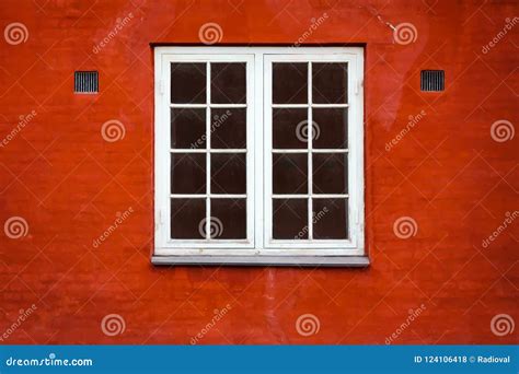 Beautiful Old Window On A Background Of The Red Brick Wall