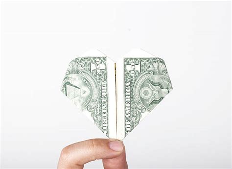 How To Fold Dollar Into Heart Stock Photos Pictures And Royalty Free
