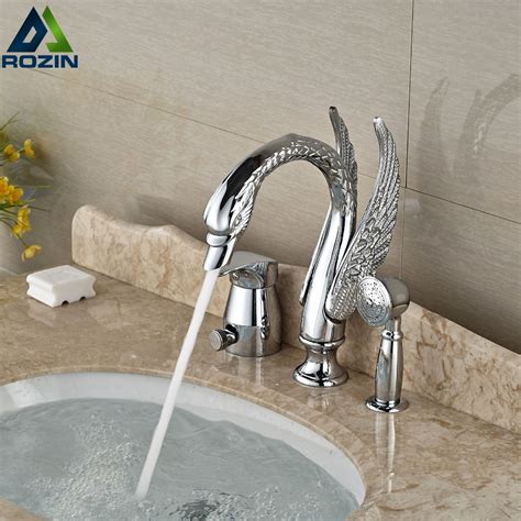 Bathing in an outdoor shower is at once luxurious and primitive: High-end Brass Swan Bathtub Mixer Faucet Deck Mount 3pcs ...