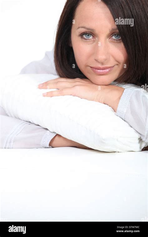 Woman Hugging Her Pillow Stock Photo Alamy