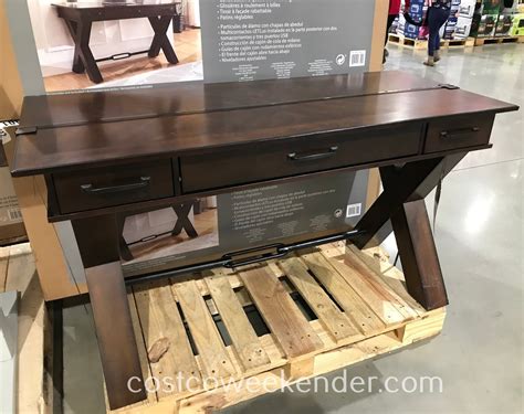 Consider adding a china cabinet or hutch to store essentials or showcase dishware. 54" Writing Desk | Costco Weekender