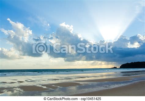 Tropical Beach Sunset Sky With Lighted Clouds Canstock