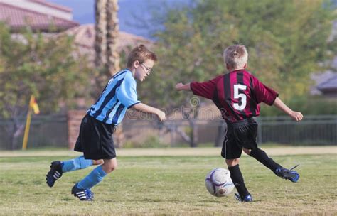 A Pair Of Youth Soccer Players Compete Editorial Photography Image Of