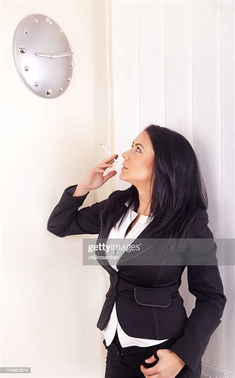 Young Business Woman Smoking Cigarette High Res Stock Photo Getty Images