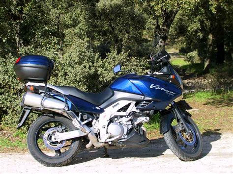 A major platform revision for the 2014 model year lent this traveling/commuting workhorse more contemporary adv style and a chassis treatment. auto stark bikes: suzuki v strom 1000