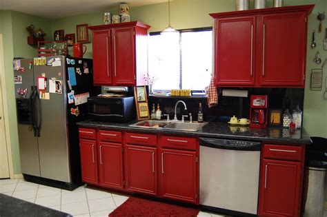 Light wood and white kitchen cabinets, white floor tiles, red walls. How to Choose the Right Stylish Red Kitchen Cabinets for ...