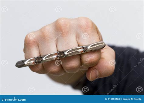 A Punch With Brass Knuckles Royalty Free Stock Image Cartoondealer