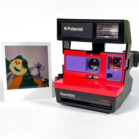 Polaroid Sun 600 With Upcycled Red And Purple Face Refreshed Cleaned