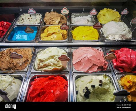 Various Italian Gelato Ice Cream Flavours In Modern Shop Display Stock