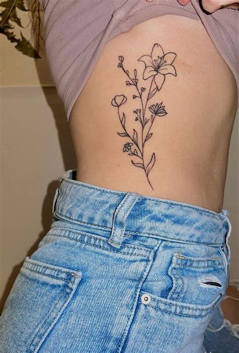 Flower Side Rib Tattoo Inspo Wildflower Tiger Lilly Tattoo Design Placement Tattoos Rib