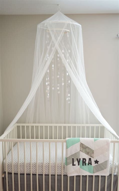 It comes with a mattress. Crib and canopy from Ikea. Crib sheet: Pottery Barn. Grey ...