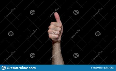 Male Hand Shows Good Job Sign Thumbs Up For Agreement Success