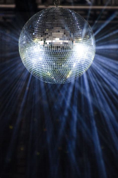 Disco Balls Create Movement In Light Because They Reflect The Light In Different Directions When