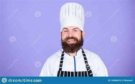 Confident In His Culinary Craft Cook With Beard And Mustache Wearing Apron Red Background Man