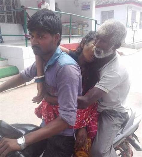 Denied Mortuary Van Bihar Man Carries Wifes Body Home On Motorcycle