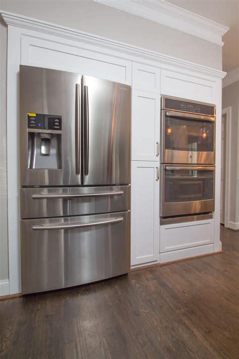 New Fridge And Double Oven Wall With Shaker Style Panels And Cabinetry