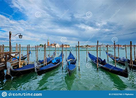 Gondolas And In Lagoon Of Venice By San Marco Square Venice Italy