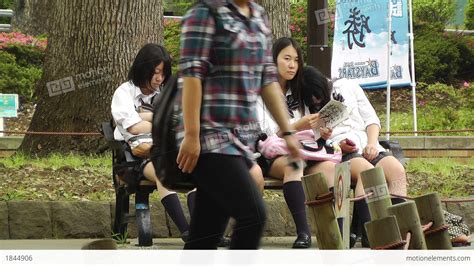 Japanese Schoolgirls Relaxing In Park In Yokohama Japan 11 Stock Video