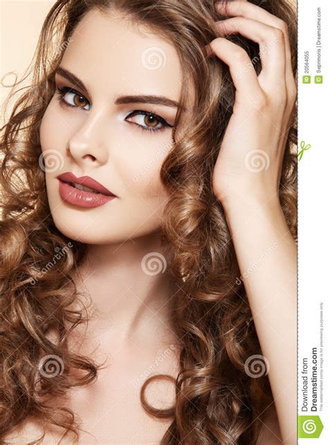 Beautiful Model Touch Her Long Shiny Curly Hair Royalty