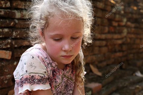 Sad Little Girl Stock Photo By ©altanaka 9745818