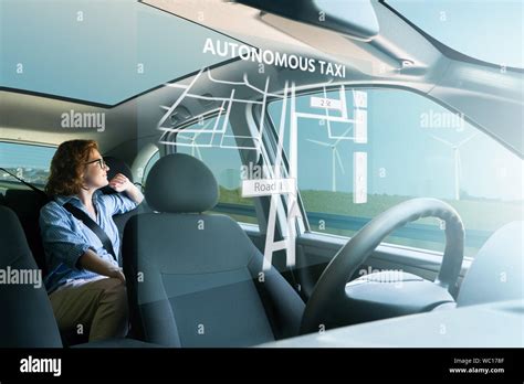 Woman Passenger Sitting In The Backseat And Looking Out The Window When Her Autonomous Self