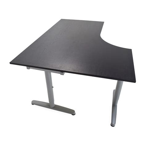 One unlocks the leg by unscrewing it (anti or counter clockwise) to change the height. 85% OFF - IKEA Galant Corner Desk / Tables