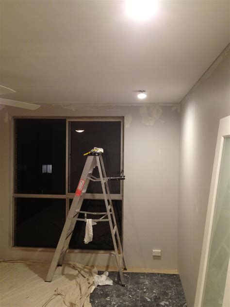 20 Down Lights Installed Painting Around Them On The New Drop Ceilings