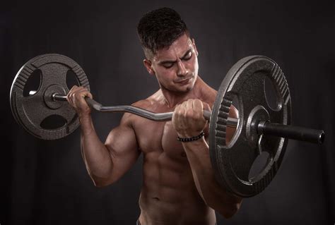 Curl Bar Workouts The Secret To Improved Muscle Definition Truism Fitness