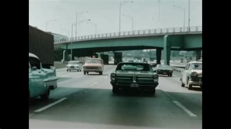 1970s Traffic Drives Down Busy Highway Ramp Appears On Illustration