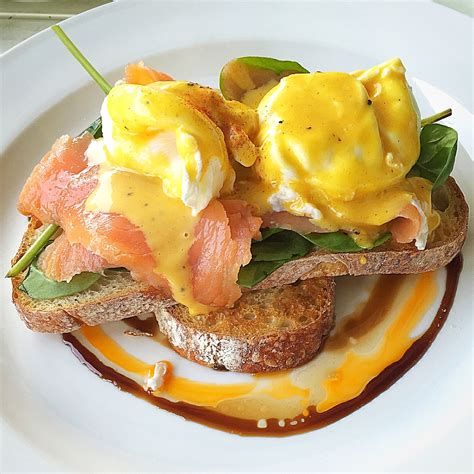 This delicate smoked salmon recipe is best enjoyed when it is not cooked into a casserole or dish. Delicious eggs benedict with smoked salmon on sourdough bread. | Eggs benedict