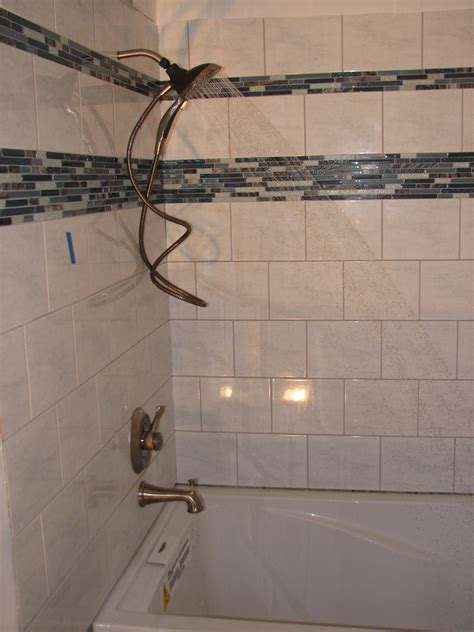 In this case the trim kit will include a shower head, tub faucet, and a valve. plumbing - Why does my shower head drip when the tub ...