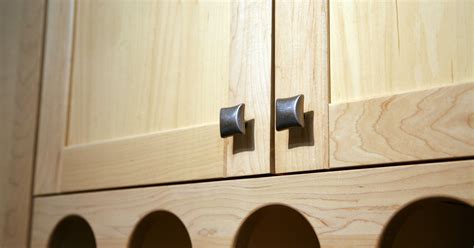 As you can see above there are 2 different size handles on our cabinets so we started with the pulls on the glass cabinets which were placed 8″ from the bottom of the door to the bottom of the hardware. Correct placement for kitchen cabinet hardware | eHow UK