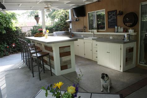 On one hand, you can choose the build a traditional. Remodelaholic | Outside Kitchenette