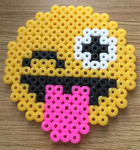 An emoji made out of Hama Beads. Enjoy 😊