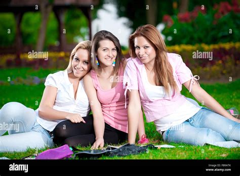 Happy Young College Girls Or High School Student Enjoy In The Park