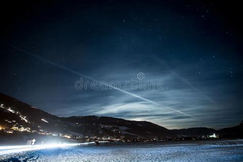 Landscape Of High Austrian Alps Covered By Snow At Starry Night Stock