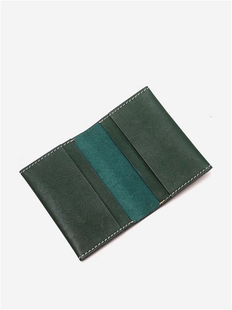 Find out if you're eligible, and get more information about. Buy Green Leather Bi Fold Card Holder for Men Online at ...