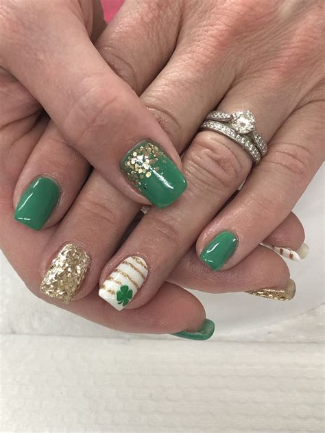 Patricks day nail designs that aren't cheesy or too hard to accomplish at home. St Patrick's Day Nails Green, Gold & Glitter Gel Nails ...