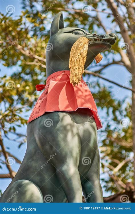 Statue Of A Kitsune Japanese Shinto Red Fox God In Fushimi Inari In