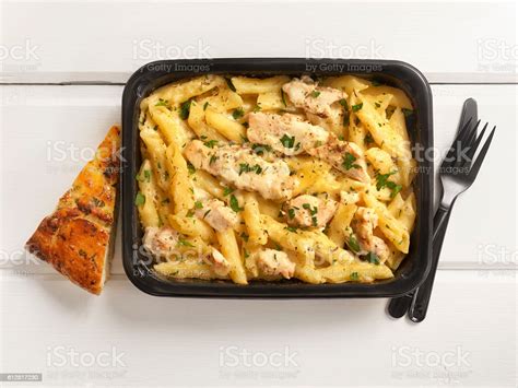 Microwave Dinner Chicken And Penne Alfredo Stock Photo Download Image