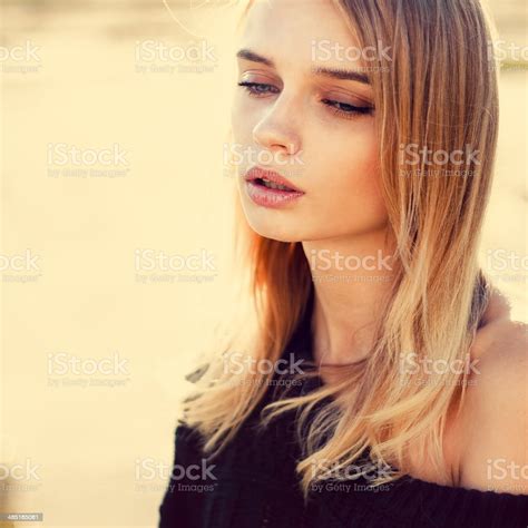 Portrait Beautiful Girl In The Sun Rays Stock Photo Download Image