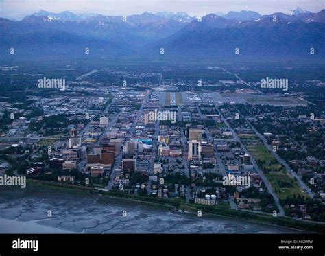 Aerial Above Anchorage Alaska From The Cook Inlet At Dusk During The