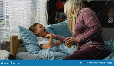 Mother Taking Care Of Sick Son Stock Photo Image Of Love Mother